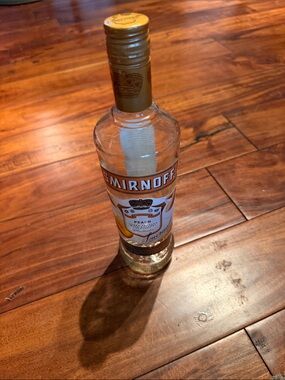 Empty Smirnoff Peach Flavored Vodka — Gold Accent Bottle